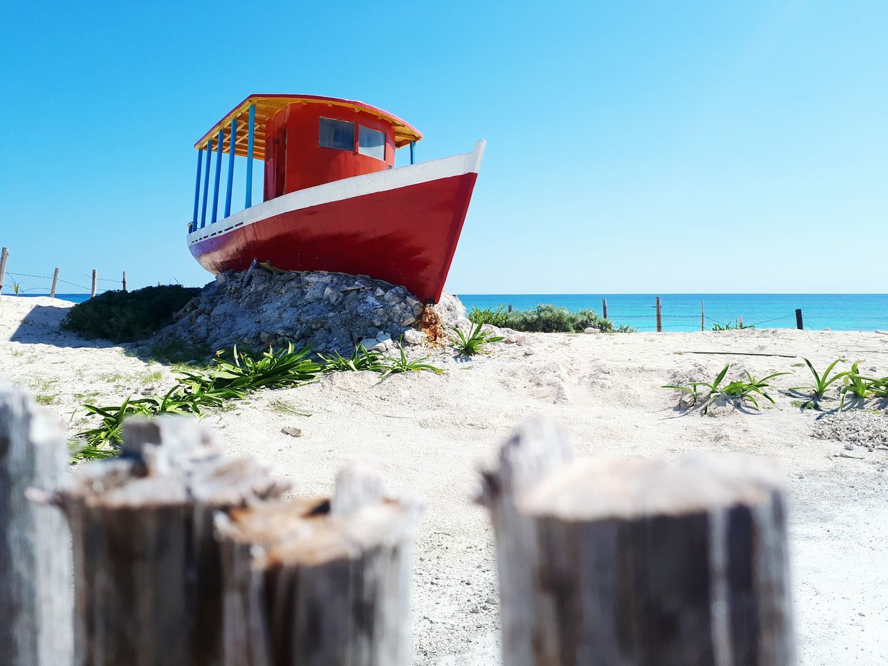 sea, day, beach, water, nature, outdoors, clear sky, no people, sand, horizon over water, beauty in nature, scenics, nautical vessel, sky, architecture