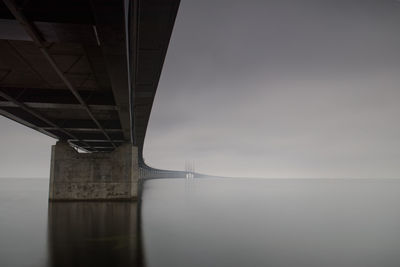 View of bridge over sea against sky