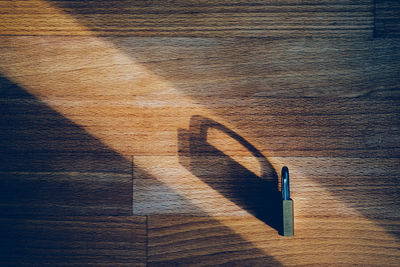 High angle view of shadow on table