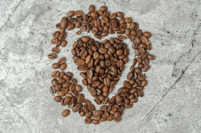 High angle view of heart shape made from coffee cup