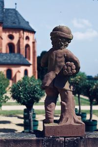 Statue of old building against sky