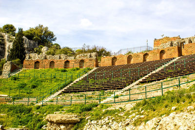 View of old ruin building against cloudy sky