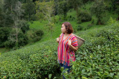 Woman standing in a farm