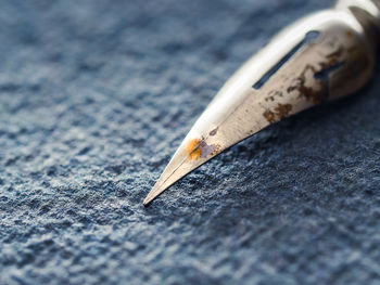 Close-up of rusty fountain pen