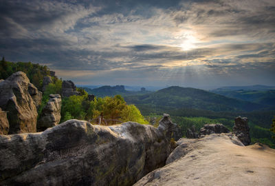 Scenic view of mountains against sky during sunset