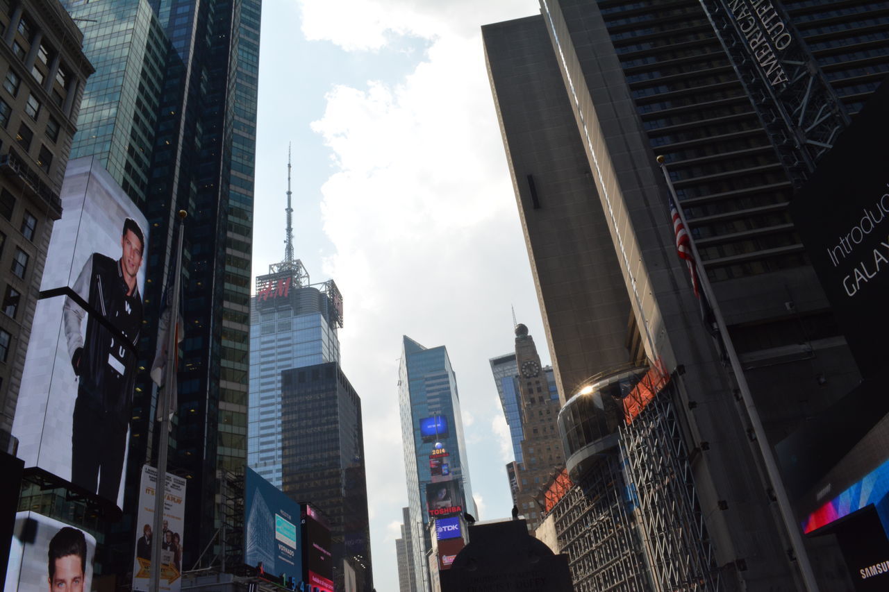 LOW ANGLE VIEW OF MODERN SKYSCRAPERS AGAINST SKY