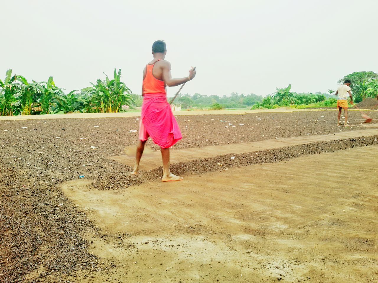 full length, lifestyles, casual clothing, childhood, leisure activity, rear view, walking, elementary age, boys, girls, standing, road, clear sky, person, day, innocence, outdoors, the way forward