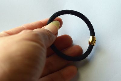 Close-up of person hand holding camera