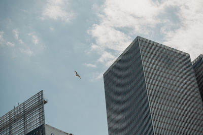 Low angle view of skyscraper against sky