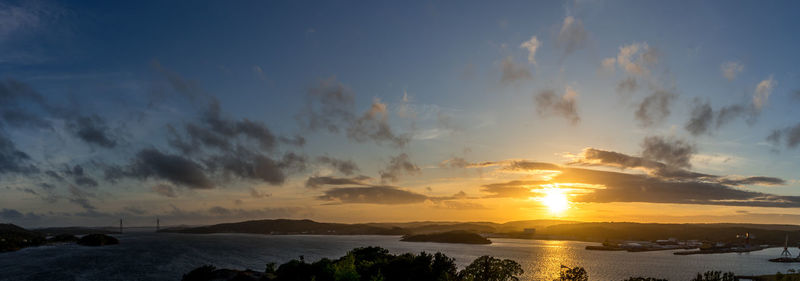 Panoramic view of silhouette landscape against sky during sunset