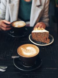 Close-up of coffee cup on table