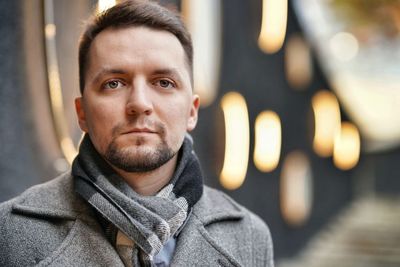 Portrait of young man looking away