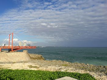 View of suspension bridge over sea