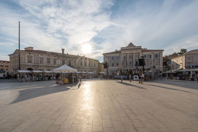 Group of people on street in town