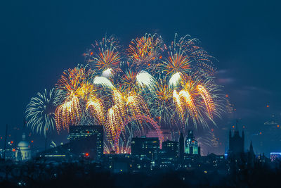 Firework display at night