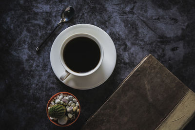 High angle view of coffee cup on table