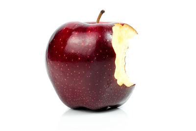 Close-up of apple against white background