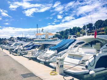 Boats moored at harbor