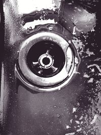 High angle view of machine part in water