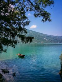 Scenic view of boats in lake