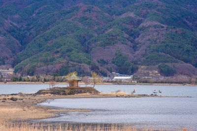 Scenic view of sea and mountain