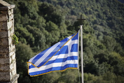 Low angle view of greek flag