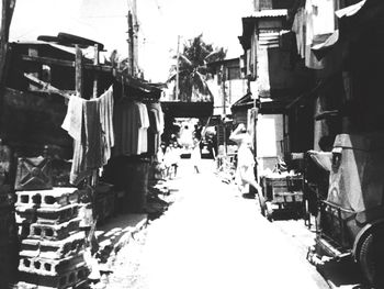 View of narrow street along buildings