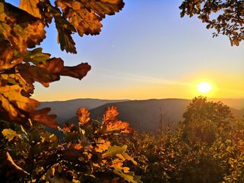 Scenic view of mountains against sky during sunset