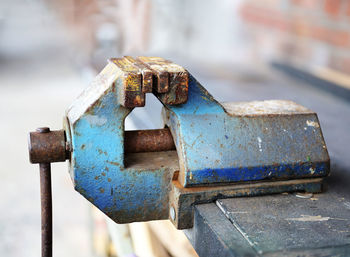 Close-up of machine part at work shop