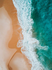 Close-up of wave on beach