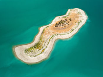 High angle view of surf on beach