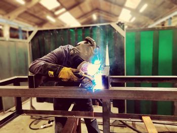 Portrait of man working in workshop