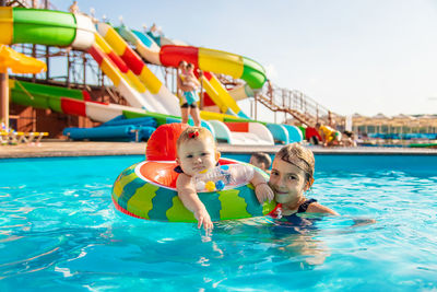 High angle view of boy playing in pool