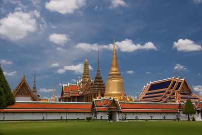 Temple outside building against sky