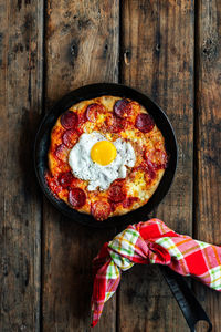 High angle view of breakfast sourdough skillet pizza