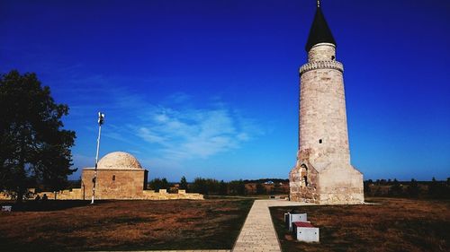 Low angle view of church against blue sky