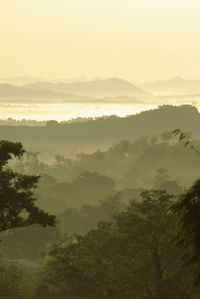 Scenic view of mountains against sky during sunset