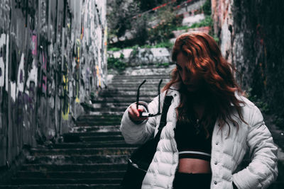 Full length of woman photographing