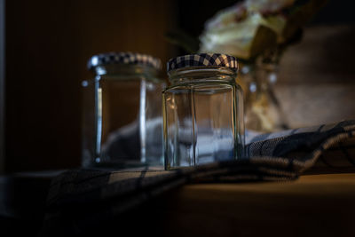 Close-up of glass jar on table