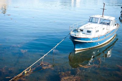 High angle view of boats moored in lake