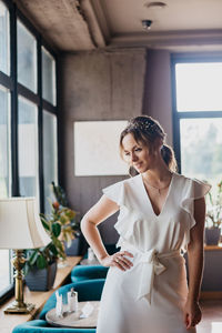 Woman sitting in a window