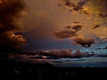 Scenic view of dramatic sky during sunset