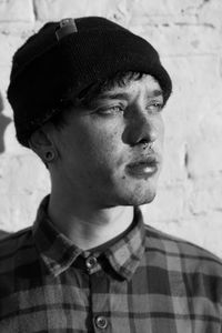 Portrait of young man looking away