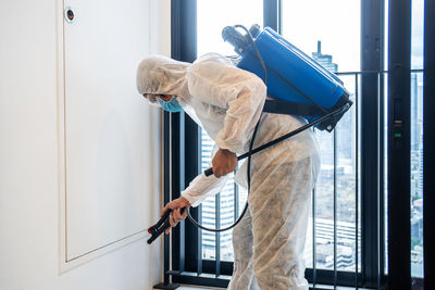 Man working at window