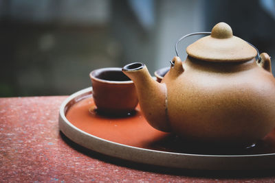 Close-up of tea cup on table