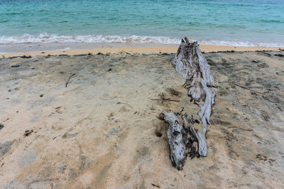 High angle view of sand on beach against sky