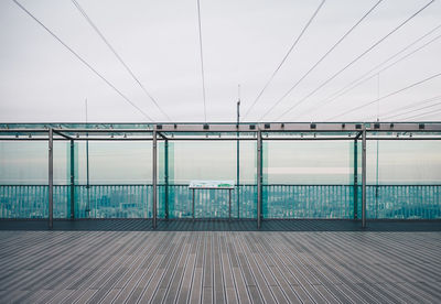 Empty bridge against sky