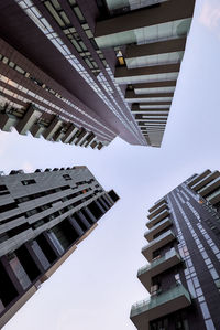 Low angle view of modern buildings against sky