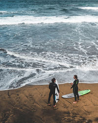 People on shore at beach