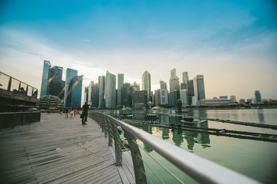 Modern buildings in city against sky